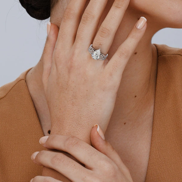 Infinie Signature Pear Cut Moissanite Bride Set in 925 Sterling Silver Item | Buy Infinie Signature Pear Cut Moissanite Bride Set in 925 Sterling Silver | SPOP Enterprise Global